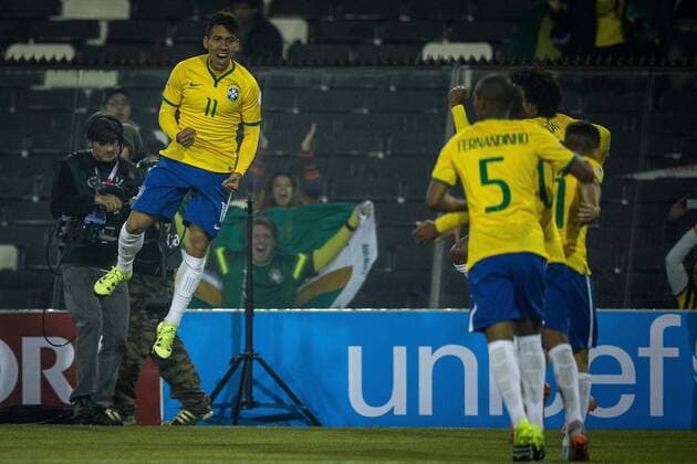 Brazil vs Venezuela SANTIAGO, CHILE - 06 21 2015: BRAZIL X VENEZUELA - Roberto Firmino from Brazil celebrates after scoring goal during the match between Brazil vs Venezuela, valid for the third round of the first phase of Group C of the Copa America 2015 held at the Estadio Monumental David Arellano. (Photo: Marcelo Machado de Melo FotoArena)  MarceloxMachadoxdexMelo