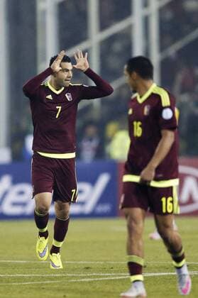Venezuela s Nicolas Fedor (L) celebrates after scoring during the Group C match against Brazil at the 2015 America Cup, held at Monumental Stadium in Santiago, Chile, June 21, 2015. Venezuela lost 1-2.) (vf) (SP)CHILE-SANTIAGO-COPA AMERICA-BRAZIL VS VENEZUELA JorgexVillegas 