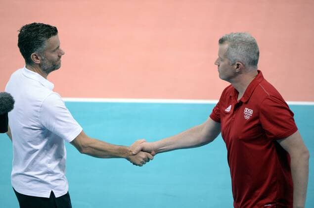 - BAKU, AZERBAIJAN: Volleyball Coach Kris Tanghe shakes hands with Germany men s national volleyball team s coach, Vital Heynen after the game between Belgium and Germany in the group stage of the men s volleyball competition at the European Games 2015, in Baku, Azerbaijan, Monday 22 June 2015. The European Games 2015 multi event takes place from 12 to 28 June. ERICxLALMAND  x04648220x
