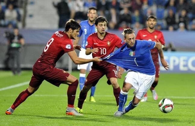 From left Goncalo Paciencia of Portugal, Bernardo Silva of Portugal and Federico Bernardeschi of Italia fight for ball during the Euro U21 U 21 soccer championship group B match Italy vs Portugal in Uherske Hradiste, Czech Republic, June 21, 2015. (CTKxPhoto DaliborxGluck) CTKPhotoP201506210643301  dg 020