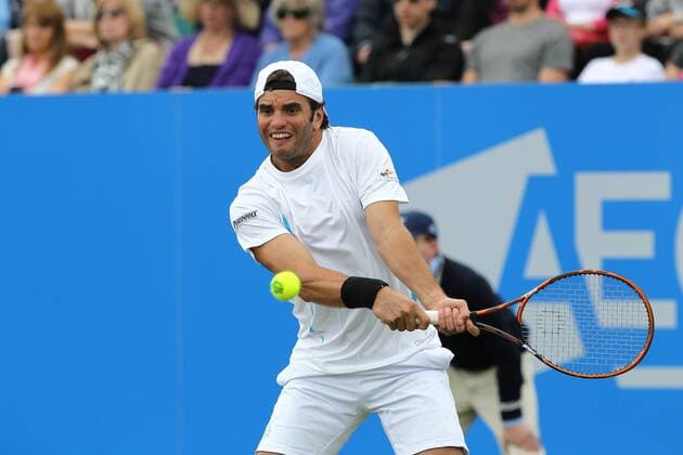 22.06.2015. Nottingham, England. Aegon Nottingham Open Tennis Tournament. A backhand from Malek Jaziri (Tunisia) as he heads towards a two set to love victory over Kyle Edmund (Great Britain) xDavidxKissmanx  ActionPlus11634210