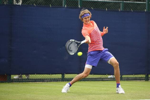 23.06.2015. Nottingham, England. Aegon Nottingham Open Tennis Tournament. Backhand from Alexander Zverev (Germany) on his way to victory in three sets against Thomaz Bellucci (Brazil) xDavidxKissmanx  ActionPlus11634513