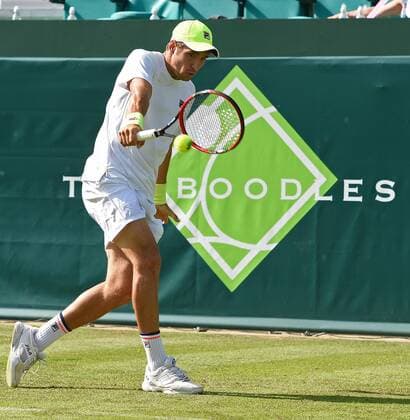 23.06.2015. Slough, England. The Boodles Tennis Tournament. Dusan Lajovic (SRB) returns an Isner serve xJonxBromleyx  ActionPlus11634620