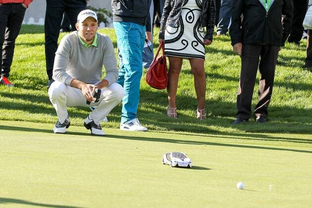 Moosinning Die Spieler muessen versuchen mit einem Modellauto den Golfball einzulochen, Maximilian Kieffer (GER) , BMW International Open 2015, Show Event, Golf, 23.06.2015 Copyright: Kolbert xEibner-Pressefoto EP_ckt