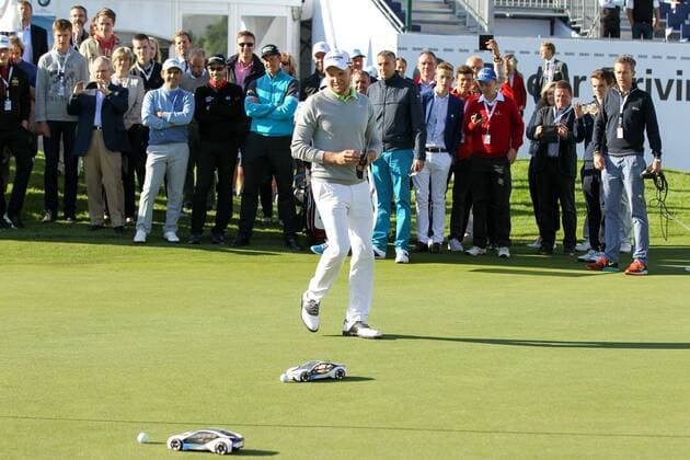 Moosinning Die Spieler muessen versuchen mit einem Modellauto den Golfball einzulochen, Maximilian Kieffer (GER) , BMW International Open 2015, Show Event, Golf, 23.06.2015 Copyright: Kolbert xEibner-Pressefoto EP_ckt