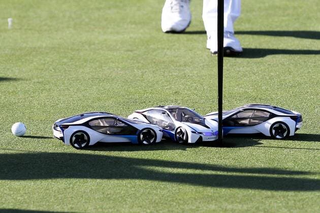 Moosinning Die Spieler muessen versuchen mit einem Modellauto den Golfball einzulochen , BMW International Open 2015, Show Event, Golf, 23.06.2015 Copyright: Kolbert xEibner-Pressefoto EP_ckt