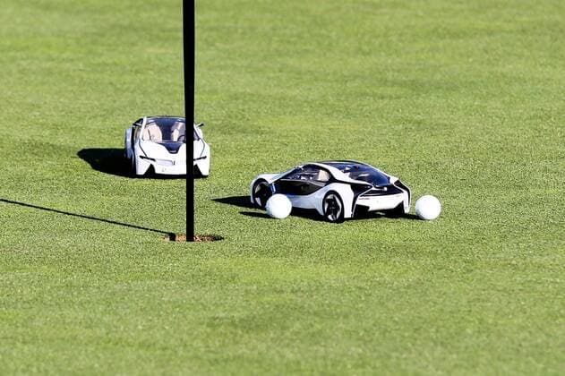Moosinning Die Spieler muessen versuchen mit einem Modellauto den Golfball einzulochen , BMW International Open 2015, Show Event, Golf, 23.06.2015 Copyright: Kolbert xEibner-Pressefoto EP_ckt