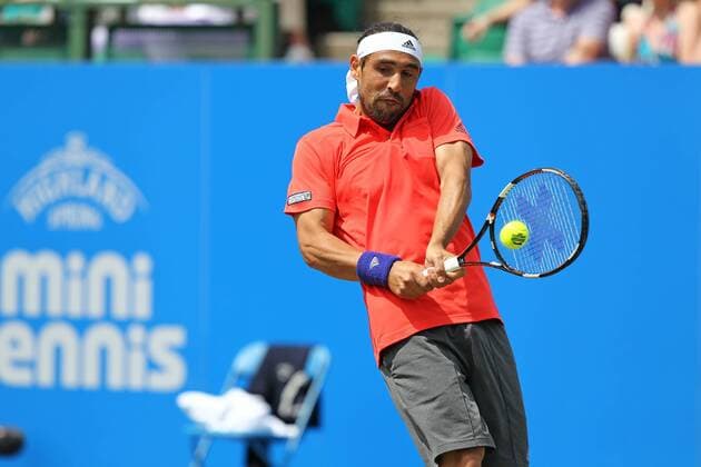 24.06.2015. Nottingham, England. Aegon Nottingham Open Tennis Tournament. Backhand from Marcos Baghdatis (Cyprus) xDavidxKissmanx  ActionPlus11634812