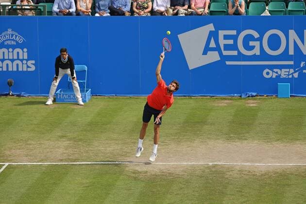 24.06.2015. Nottingham, England. Aegon Nottingham Open Tennis Tournament. Gilles Simon (France) serves to Joao Sousa (Portugal) at the start of their match. Gilles Simon (France) won by two sets to love xDavidxKissmanx  ActionPlus11634813