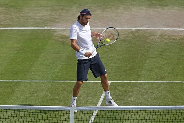 24.06.2015. Nottingham, England. Aegon Nottingham Open Tennis Tournament. Backhand volley from Joao Sousa (Portugal) xDavidxKissmanx  ActionPlus11634814