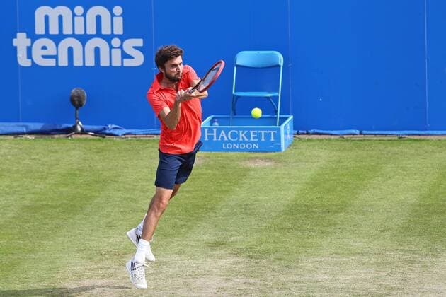 24.06.2015. Nottingham, England. Aegon Nottingham Open Tennis Tournament. Gilles Simon (France) with a fierce backhand drive during his match with Joao Sousa (Portugal) xDavidxKissmanx  ActionPlus11634815