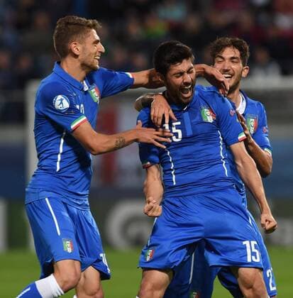 Marco Benassi (center) and his teammates of Italian team celebrate goal during the Euro U21 U 21 soccer championship group B match England vs Italy in Olomouc, Czech Republic, on Wednesday, June 24, 2015. (CTKxPhoto LudekxPerina) CTKPhotoP201506240958901  LPE 003