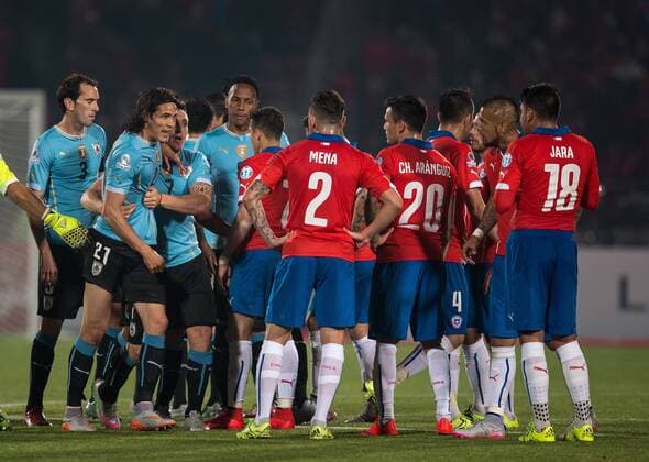 Chile-Uruguay SANTIAGO, CHILE - 24 06 2015: CHILE X Edinson Cavani of Uruguay is sent off after receiving yellow and red later, after friction with Gonzalo Jara of Chile during the match between Brazil vs Colombia, valid for the quarterfinals of the Copa America 2015 held at the National Stadium Julio Mart?nez Pr?danos. (Photo: Marcelo Machado de Melo FotoArena)  MarceloxMachadoxdexMelo