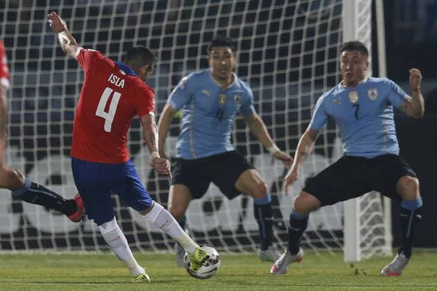 Copa America 2015 . Chile s Mauricio Isla, left , scores his goal against Uruguay during the match of quarter finals of the 2015 Copa America at La Serena stadium. Santiago, Chile. 24 06 2015 Marcelo Hernandez Photosport Chile v Uruguay, Copa America 2015. 
