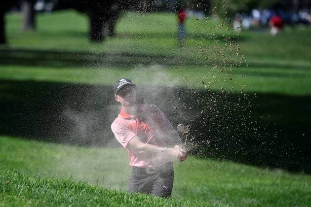 June 25, 2015 - Cromwell, Connecticut , U.S. - Jonas Blixt tries to watch the flight of his ball through a cloud of sand on the 7th fairway during the first round of the PGA Golf Herren Travelers Championship tournament held at TPC River Highland in Cromwell Connecticut. Eric Canha CSM PGA 2015: Travelers Championship JUN 25 - ZUMAc04_
