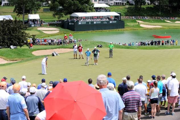 June 25, 2015 - Cromwell, Connecticut , U.S. - Bubba Watson putts on the first hole as Hunter Mahan (green) and Zach Johnson (blue) watch during the first round of the PGA Golf Herren Travelers Championship tournament held at TPC River Highland in Cromwell Connecticut. Eric Canha CSM PGA 2015: Travelers Championship JUN 25 - ZUMAc04_