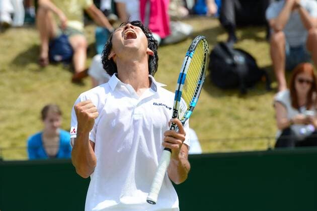 June 25, 2015 - Roehampton, England - YUICHI SUGITA of Japan celebrated match point in his match v. D. Evansi in the Wimbledon Qualifying Tournament in Roehampton England on Thursday June 25 2015 Tennis 2015 - Wimbledon Qualifying Tournament - ZUMAl132
