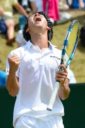 June 25, 2015 - Roehampton, England - YUICHI SUGITA of Japan celebrated match point in his match v. D. Evansi in the Wimbledon Qualifying Tournament in Roehampton England on Thursday June 25 2015 Tennis 2015 - Wimbledon Qualifying Tournament - ZUMAl132