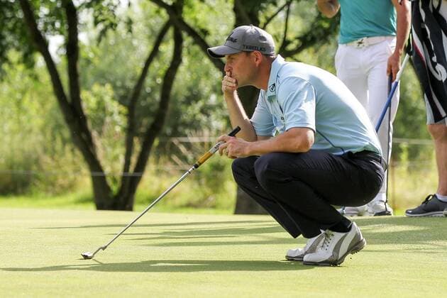 Moosinning David Howell (ENG) beim lesen der Puttlinie , BMW International Open 2015, Tag 1, Golf, 25.06.2015 , Copyright: Kolbert Eibner-Pressefoto EP_CKT