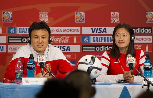 OTTAWA, June 25, 2015 -- Hao Wei (L), head coach of China, and Wu Haiyan, captain of China, attend the press conference PK Pressekonferenz in Ottawa, Canada, June 25, 2015. China will play the United States in the quarterfinal match of 2015 FIFA Women s world cup here on June 26. ) (SP)CANADA-OTTAWA-FIFA-WOMEN S WORLD CUP-QUARTERFINALS-PRESS CONFERENCE-CHINA ZouxZheng 