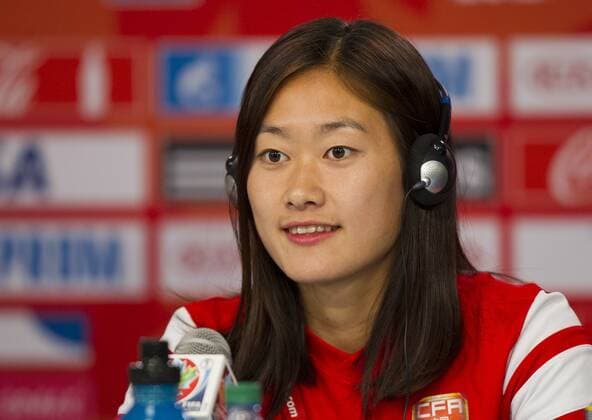 OTTAWA, June 25, 2015 -- Wu Haiyan, captain of China, attends the press conference PK Pressekonferenz in Ottawa, Canada, June 25, 2015. China will play the United States in the quarterfinal match of 2015 FIFA Women s world cup here on June 26. ) (SP)CANADA-OTTAWA-FIFA-WOMEN S WORLD CUP-QUARTERFINALS-PRESS CONFERENCE-CHINA ZouxZheng 