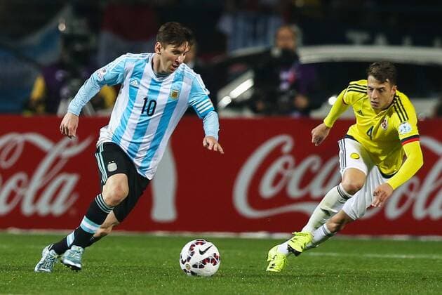 Football , Argentina v Colombia. Copa America Championship 2015 . Argentina s player Lionel Messi, left, battles for the ball against Santiago Arias of Colombia during the 2015 Copa America football championship quarterfinal match at the Sausalito stadium in Vina del Mar, Chile. 26 06 2015 Fotoarena Photosport Argentina v Colombia, Copa America 2015. 