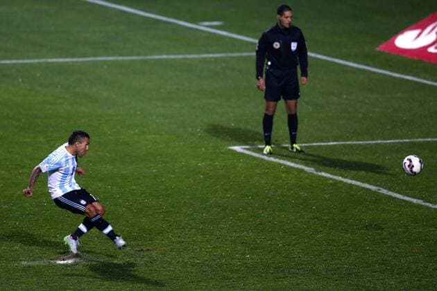 Football , Argentina v Colombia. Copa America Championship 2015 . Argentina s player Carlos Tevez, scores the classification goal against Colombia during the 2015 Copa America football championship quarterfinal match at the Sausalito stadium in Vina del Mar, Chile. 26 06 2015 Adrian Aylwin Photosport Argentina v Colombia, Copa America 2015. 
