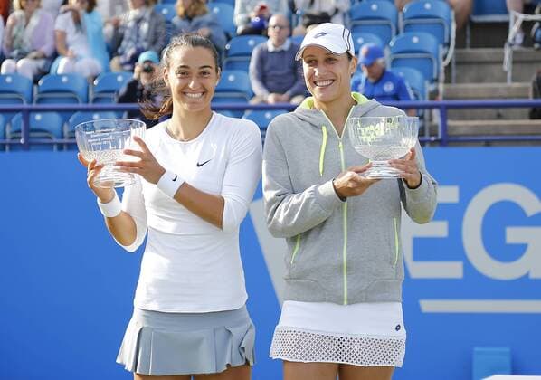 27.06.2015 Eastbourne, England. Aegon International Eastbourne Tennis Tournament Caroline Garcia (FRA) and Katarina Serbotnil (SLO) with their trophies after winning the Women s doubles final against Zheng Jie and Chan Yung-Jan at Devonshire park. xHongboxChenx  ActionPlus11635629