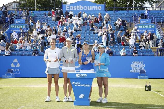 27.06.2015 Eastbourne, England. Aegon International Eastbourne Tennis Tournament Caroline Garcia (FRA) and Katarina Serbotnil (SLO) with their trophies after winning the Women s doubles final against Zheng Jie and Chan Yung-Jan at Devonshire park. xHongboxChenx  ActionPlus11635630