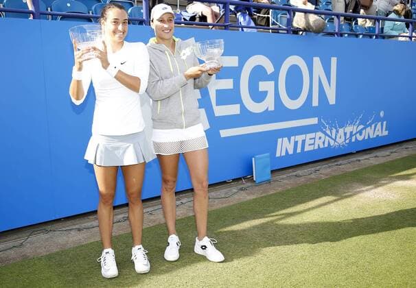 27.06.2015 Eastbourne, England. Aegon International Eastbourne Tennis Tournament Caroline Garcia (FRA) and Katarina Serbotnil (SLO) with their trophies after winning the Women s doubles final against Zheng Jie and Chan Yung-Jan at Devonshire park. xHongboxChenx  ActionPlus11635631