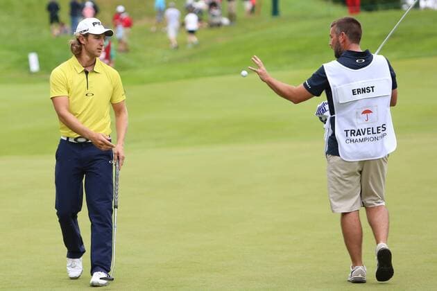 June 27, 2015 - Cromwell, Connecticut, U.S - Derek Ernst tosses his ball to his caddy during the third round of the Travelers Championship at TPC River Highlands in Cromwell, Connecticut. Golf 2015 - Travelers Championship - Round 3 - ZUMAc119