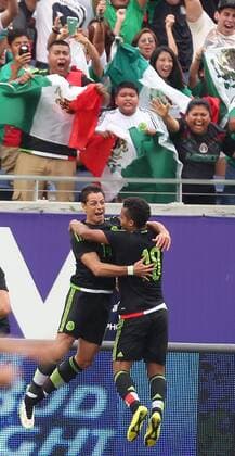 June 27, 2015 - Orlando, FL, USA - Mexico s Javier Hernandez, left, and Giovani Dos Santos celebrate after Hernandez scored a goal against Costa Rica in an International Friendly Länderspiel at the Orlando Citrus Bowl on Saturday, June 27, 2015, in Orlando, Fla. The game ended in a 2-2 draw. Mexico v. Costa Rica - ZUMAm67_