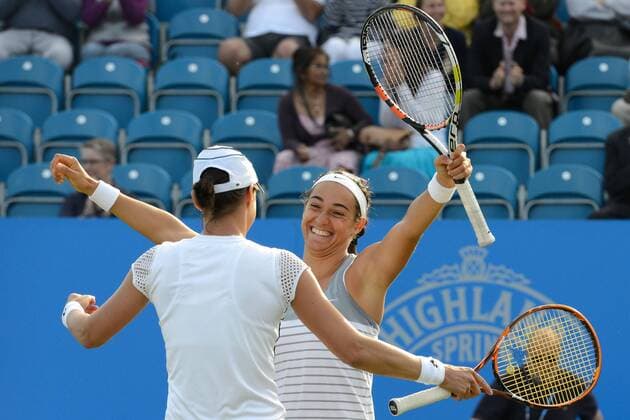 June 27, 2015 - Eastbourne, England - KATARINA SREBOTNIK of Slovenia (left) and CAROLINE GARCIA of France celebrate match point in the doubles finals at The Aegon International Tennis Tournament in Eastbourne England on Saturday June 27 2015 Tennis 2015 - Aegon International - ZUMAl132