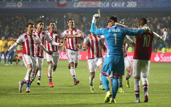 Paraguay s players celebrate victory after winning a quarter-final match between Brazil and Paraguay in Concepcion, Chile, June 27, 2015. Paraguay defeated Brazil 4-3 on penalties after a 1-1 draw thus qualified to the semi-final round. ) (SP)CHILE-CONCEPCION-AMERICAN CUP-QUARTERFINAL-BRAZIL VS PARAGUAY XuxZijian 