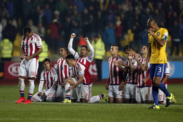 Paraguay s players react during the penalty phase of a quarter-final match between Brazil and Paraguay in Concepcion, Chile, June 27, 2015. Paraguay defeated Brazil 4-3 on penalties after a 1-1 draw thus qualified to the semi-final round. ) (vf) (SP)CHILE-CONCEPCION-AMERICAN CUP-BRAZIL VS PARAGUAY GuillermoxArias 