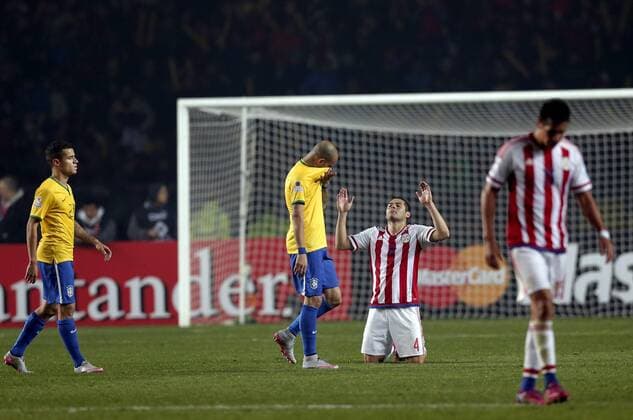 Paraguay s Pablo Aguilar (2nd r) reacts during a quarter-final match between Brazil and Paraguay in Concepcion, Chile, June 27, 2015. Paraguay defeated Brazil 4-3 on penalties after a 1-1 draw thus qualified to the semi-final round. ) (vf) (SP)CHILE-CONCEPCION-AMERICAN CUP-BRAZIL VS PARAGUAY GuillermoxArias 