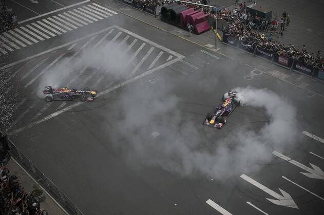Drivers of the Infiniti Red Bull racing team take part in a F1 demonstration held on a racing circuit at the Zocalo Square of Mexico City, capital of Mexico, on June 27, 2015. Fans gathered on Saturday in the Zocalo of Mexico City to attend the exhibition of the Australian driver Daniel Ricciardo and the Spanish driver Carlos Sainz Jr. from Infiniti Red Bull racing team. With this, the Formula 1 prepares its return to Mexico, a country that does not host a race since 1992, and will again receive a F1 Grand Prix from Oct. 30 to Nov. 1, according to local press information. Alejandro Ayala) (jg) (SP)MEXICO-MEXICO CITY motor racing Motorsport F1 e AlejandroxAyala 