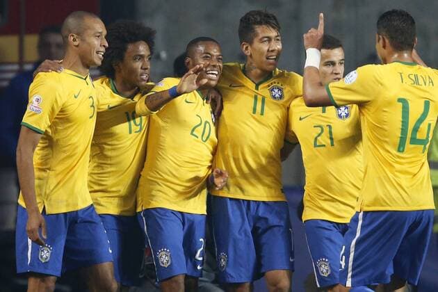 Football , Brazil v Paraguay. Copa America Championship 2015 . Brasil s player Robinho, center, celebrates with teammates scoring against Paraguay during the 2015 Copa America football championship quarterfinal match at the Ester Roa stadium in Concepcion, Chile. 27 06 2015 Andres Pina Photosport Brasil v Paraguay, Copa America 2015. 