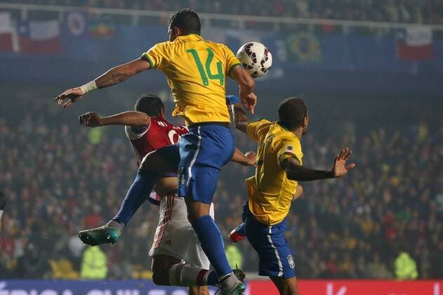 Football, Brasil v Paraguay. Copa America 2015. Brasil s player Thiago Silva, left, battles for the ball against Roque Santa Cruz of Paraguay during the Copa America Finals Quarters, at Bicentenario Ester Roa stadium. Concepcion, Chile. 27 06 2015 Dragomir Yankovic Photosport Brasil v Paraguay, Copa America 2015. 