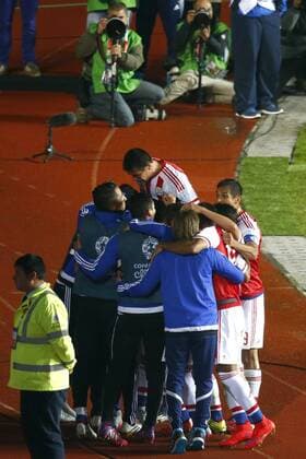 Football , Brazil v Paraguay. Copa America Championship 2015 . Paraguay player Derlis Gonzalez, center, celebrates scoring against Brazil during the 2015 Copa America football championship quarterfinal match at the Ester Roa stadium in Concepcion, Chile. 27 06 2015 Adrian Aylwin Photosport Brasil v Paraguay, Copa America 2015. 