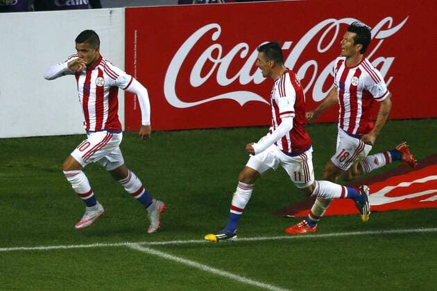 Football , Brazil v Paraguay. Copa America Championship 2015 . Paraguay player Derlis Gonzalez, left, celebrates scoring against Brazil during the 2015 Copa America football championship quarterfinal match at the Ester Roa stadium in Concepcion, Chile. 27 06 2015 Adrian Aylwin Photosport Brasil v Paraguay, Copa America 2015. 