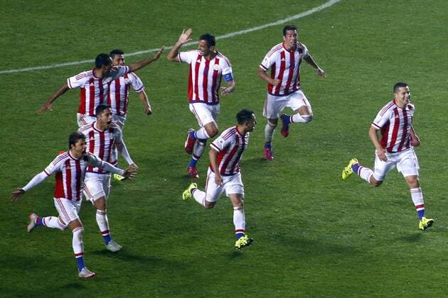Football , Brazil v Paraguay. Copa America Championship 2015 . Paraguay players, celebrate their triumph against Brazil during the 2015 Copa America football championship quarterfinal match at the Ester Roa stadium in Concepcion, Chile. 27 06 2015 Adrian Aylwin Photosport Brasil v Paraguay, Copa America 2015. 