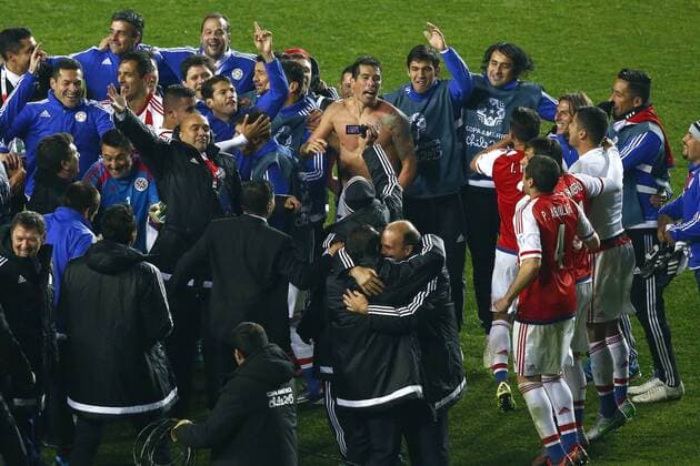 Football , Brazil v Paraguay. Copa America Championship 2015 . Paraguay players, celebrate their triumph against Brazil during the 2015 Copa America football championship quarterfinal match at the Ester Roa stadium in Concepcion, Chile. 27 06 2015 Adrian Aylwin Photosport Brasil v Paraguay, Copa America 2015. 