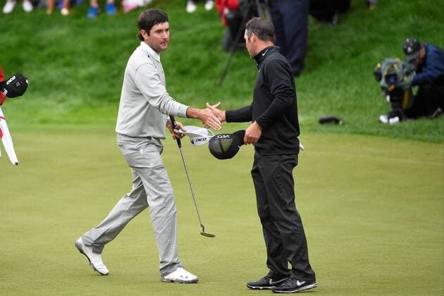 June 28, 2015 - Cromwell, Connecticut , U.S. - Bubba Watson (left) and Paul Casey (right) shake hands on the 18th green at the PGA Golf Herren Travelers Championship tournament held at TPC River Highland in Cromwell Connecticut. Bubba Watson and Paul Casey ended their rounds tied for the championship and played two tie-breaker rounds before Watson finally defeated Casey in the second tie-breaker. Eric Canha CSM PGA 2015: Travelers Championship JUN 28 - ZUMAc04_