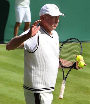 Tennis - 2015 Wimbledon Championships - Week One, Monday Djokovic coach, Boris Becker warms up for his match against Philipp Kohschreiber COLORSPORT ANDREW COWIE 