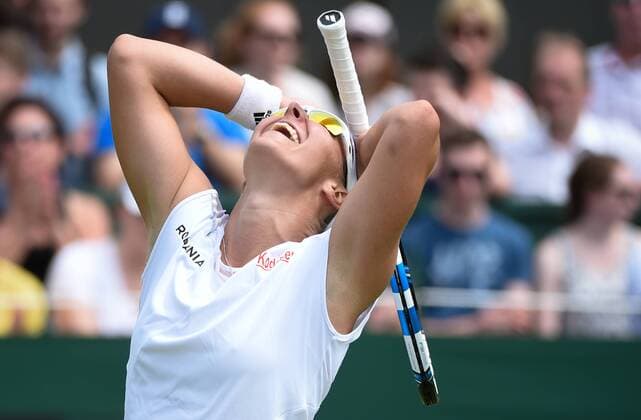 - LONDON, UNITED KINGDOM: Belgian Kirsten Flipkens celebrates after winning the first round match between Belgian Kirsten Flipkens and German Annika Beck at the 2015 Wimbledon grand slam tennis tournament at the All England Tennis Club, in southwest London, Britain, Monday 29 June 2015. BENOITxDOPPAGNE  x04653701x