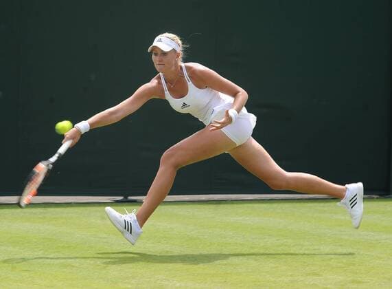 Tennis - 2015 Wimbledon Championships - Week One, Monday Women s Singles, First Round Kristina Mladenovic (FRA) vs. Alexandra Dulgheru (ROU) Kristina Mladenovic on Court 5 COLORSPORT ANDREW COWIE 