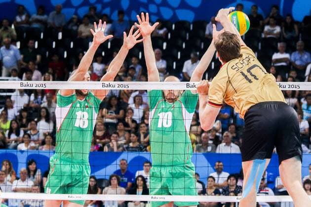 June 28, 2015 - Baku, Azerbaijan - Nikolay Nikolov (18) and Valentin BRATOEV (10) of Bulgaria are jumping on the net on the hit of Jochen Schops (10) of Germany in the match Germany - Bulgaria during the final for gold at Baku 2015 European Games at the Crystal Hall on June 28, 2015 in Baku, Azerbaijan. Baku 2015: Volleyball - Men s Volleyball final  - ZUMAn230