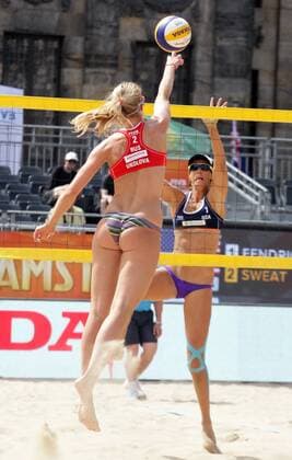 Ukolova (L) and Birlova of Russia attacks Fendrick and Sweat of USA during the FIVB Beach volleyball Beachvolleyball World Championships female match between Russia vs USA at pool A on June 29, 2015 in Amsterdam, Netherlands. Imago Paulo Amorim