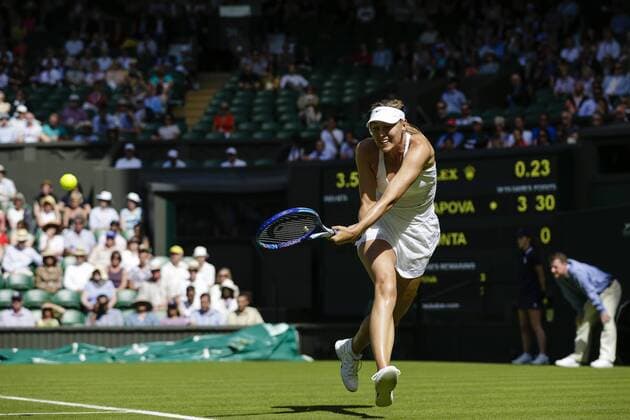 29.06.2015. Wimbledon, England. The Wimbledon Tennis Championships. Ladies& x2019; Singles first round match between fourth seed Maria Sharapova (RUS) &amp; Johanna Konta (GBR). Maria Sharapova in action xCraigxMercerx  ActionPlus11636199